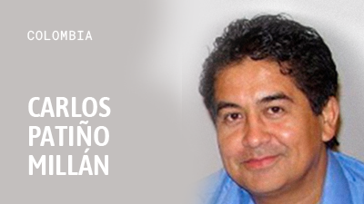 Nombre de Carlos Patiño Millán sobre una fotografía de su rostro