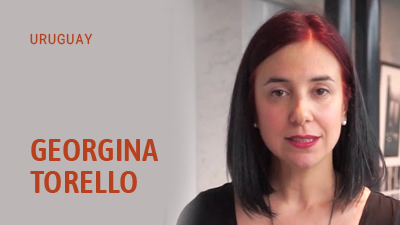 Nombre de Georgina Torello sobre una fotografía de su rostro